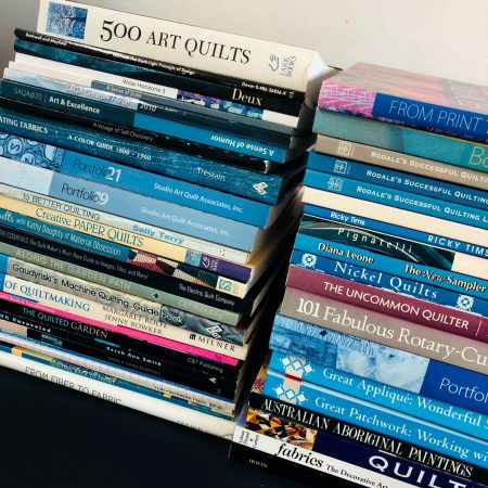 Serendipity Studio Book Sale - two piles of books