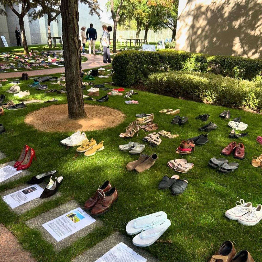 Shoes on grass in courtyard at Parliament House Canberra